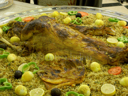 https://www.anissas.com/blog1/wp-content/uploads/2012/02/qatari-feast-roast-lamb-with-close-up-on-fat-tail-copy.jpg